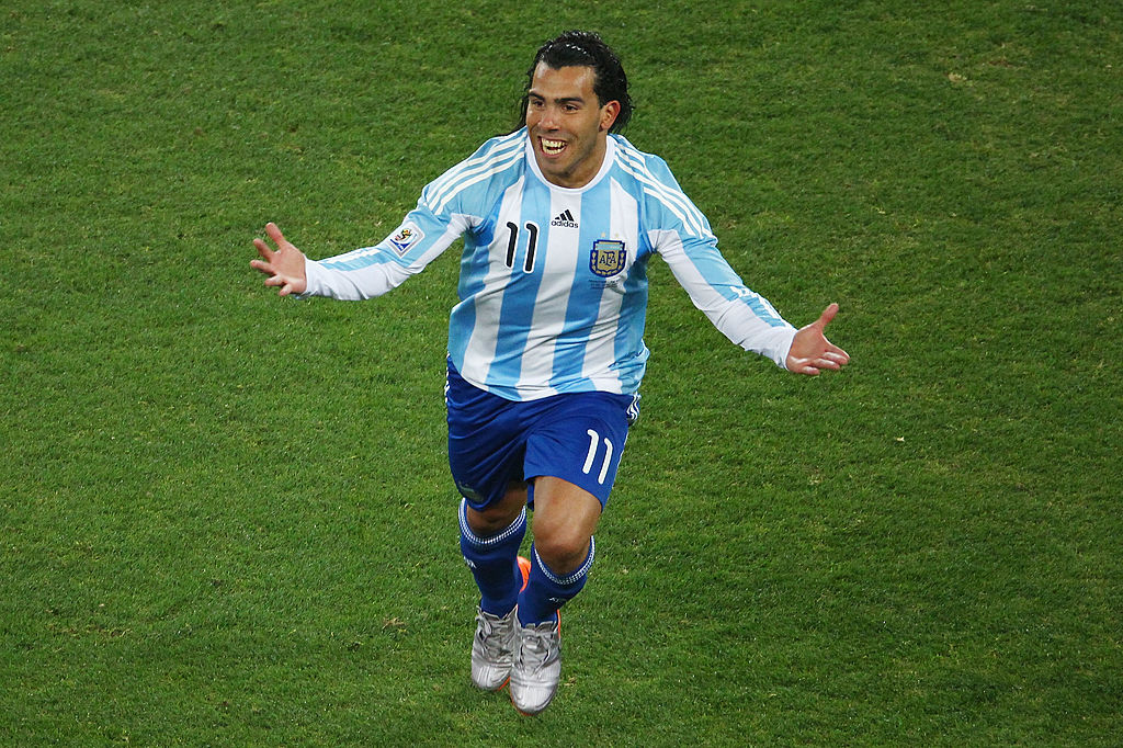 JOHANNESBURG, SOUTH AFRICA - JUNE 27:  Carlos Tevez of Argentina celebrates scoring the third goal for his team during the 2010 FIFA World Cup South Africa Round of Sixteen match between Argentina and Mexico at Soccer City Stadium on June 27, 2010 in Johannesburg, South Africa.  (Photo by Lars Baron/Getty Images)