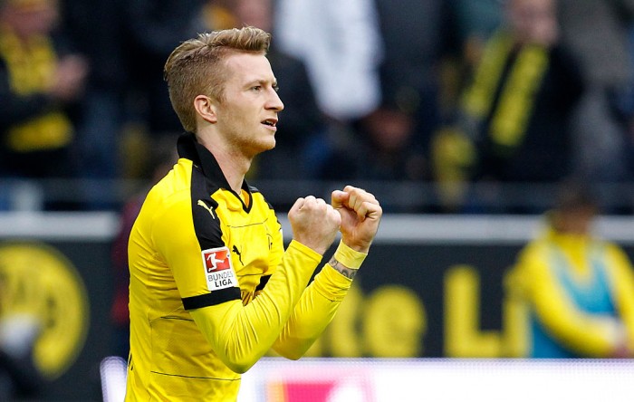 DORTMUND, GERMANY - OCTOBER 25:  Marco Reus of Dortmund celebrates scoring the 3:0 goal during the Bundesliga match between Borussia Dortmund and FC Augsburg at Signal Iduna Park on October 25, 2015 in Dortmund, Germany.  (Photo by Mika Volkmann/Bongarts/Getty Images)