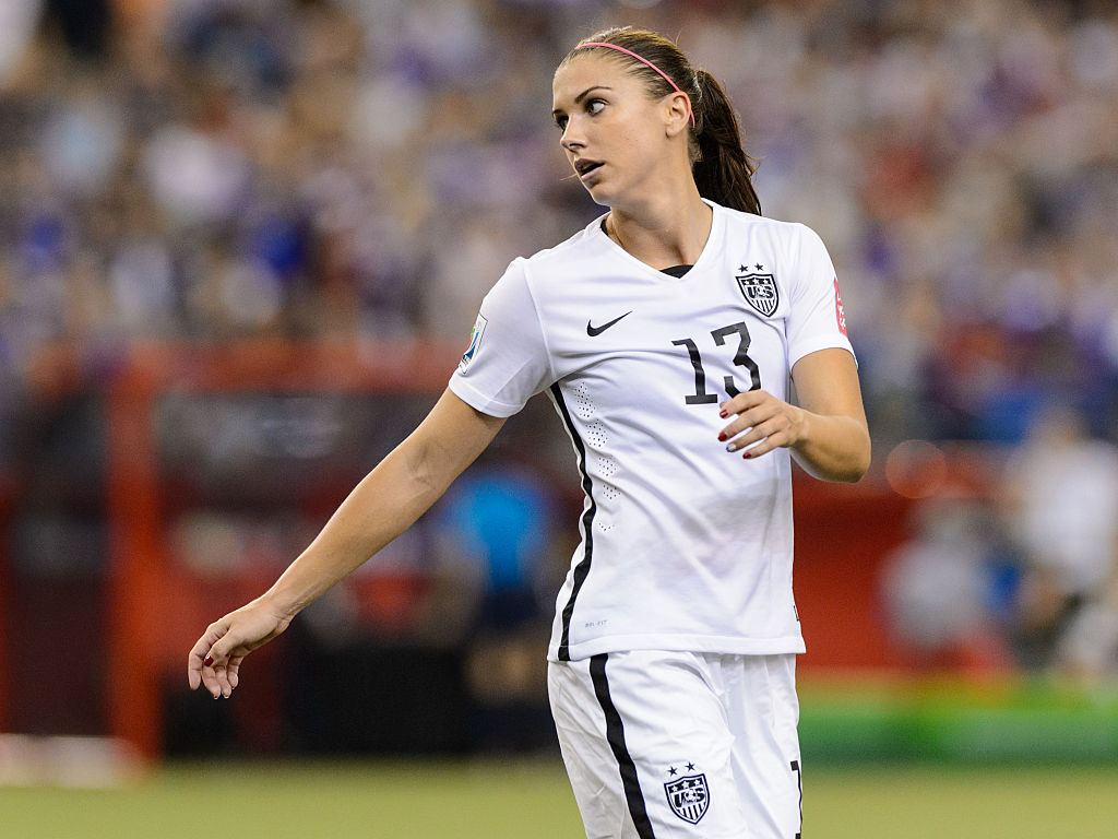 MONTREAL, QC - JUNE 30: Alex Morgan #13 of USA looks on during the 2015 FIFA Women's World Cup semi final match against Germany at Olympic Stadium on June 30, 2015 in Montreal, Quebec, Canada. The United States defeated Germany 2-0 and move to the final round. (Photo by Minas Panagiotakis/Getty Images)