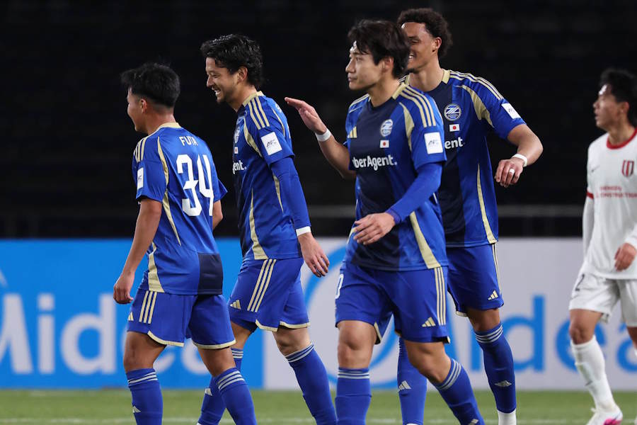 首位通過をした町田【写真：AFC】